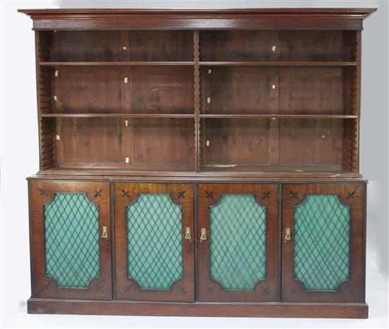 A 19th century mahogany bead moulded and ebony line inlaid bookcase, W.7ft 6in.